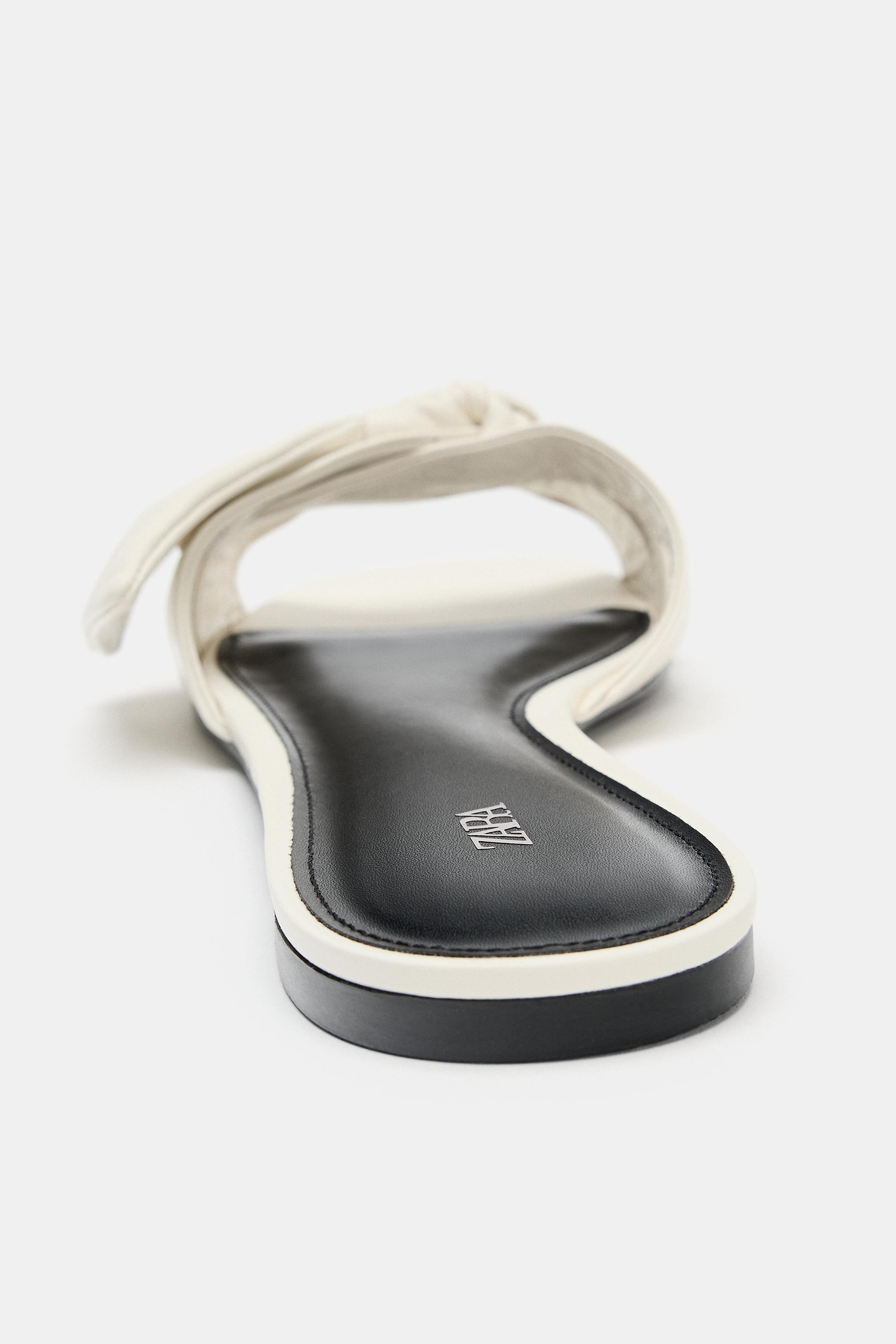 LEATHER BOW FLAT SANDALS